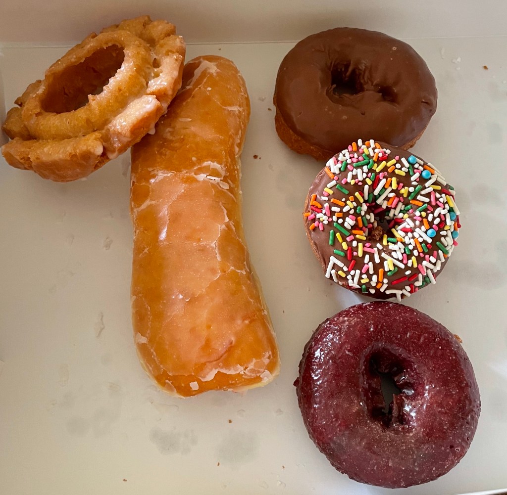 Assorted donuts in a box.